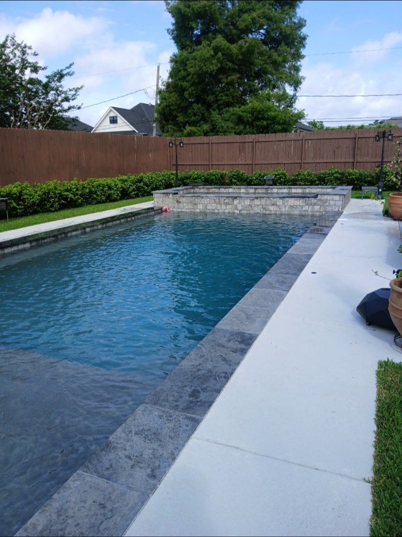 Chalmette custom swimming pool and raised spa by Nova Pools & Spas