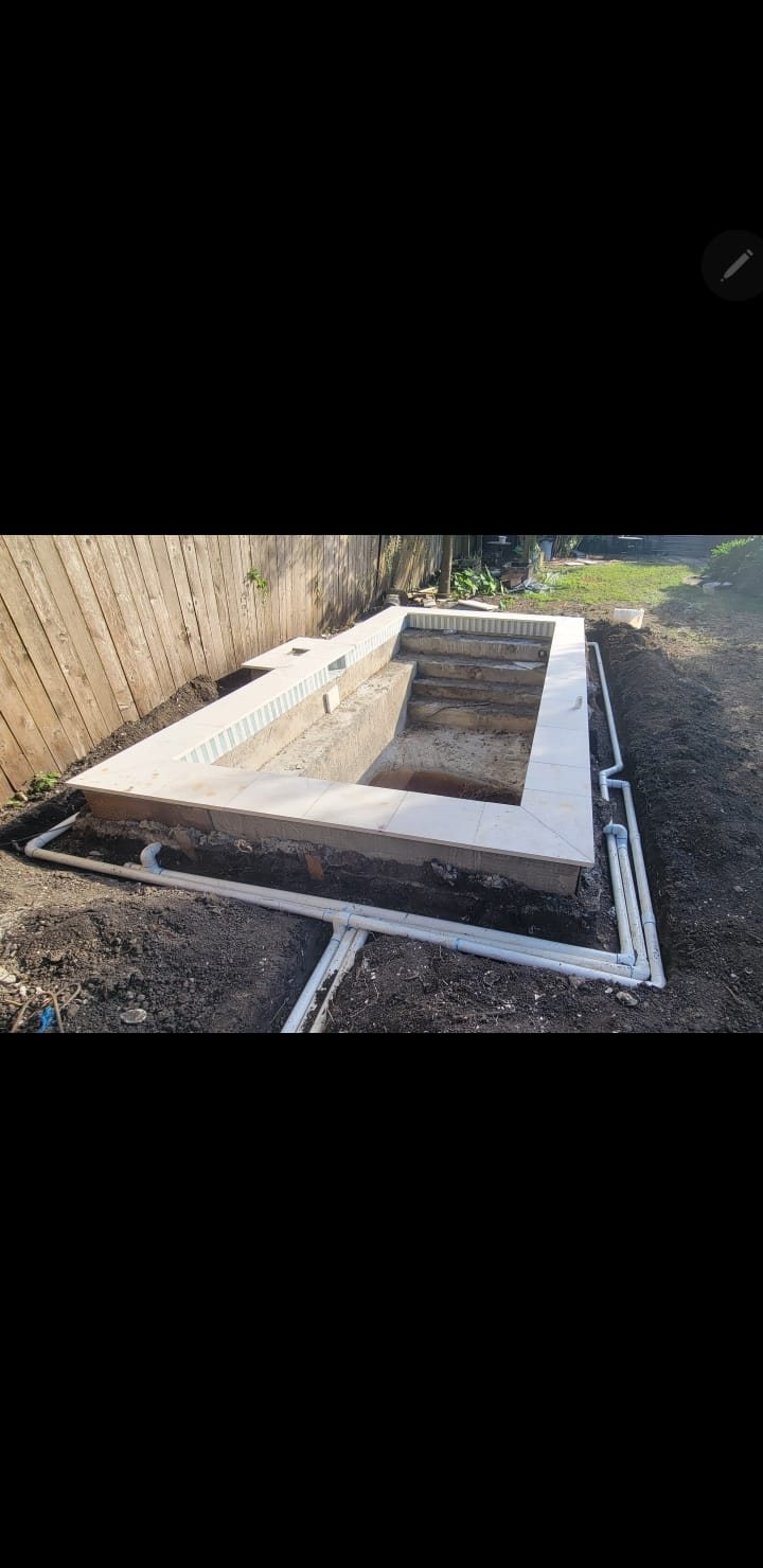 Mid-City New Orleans pool coping and plumbing progress